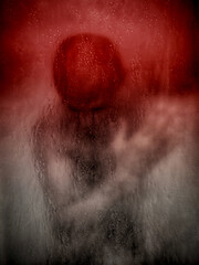 A man with hands on his head expressing fear and anxiety.