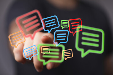 Image of colorful speech bubbles representing online communication, messaging, and social media.