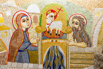 Mosaic depicting John the Baptist and woman praying to the Lamb of God in Santo Domingo de la...
