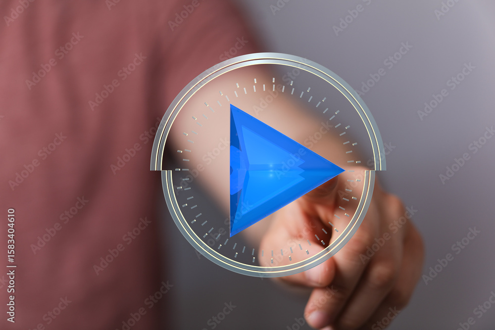 Aufkleber close-up of hand interacting with a digital play button interface. modern technology concept.