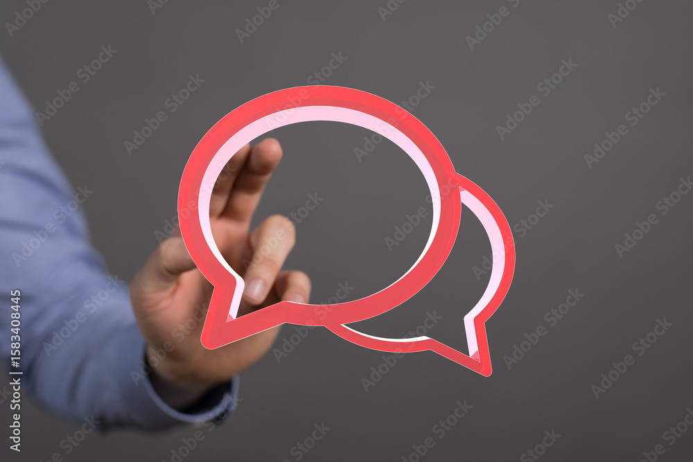 Poster abstract image of a hand interacting with digital speech bubbles, representing communication and con