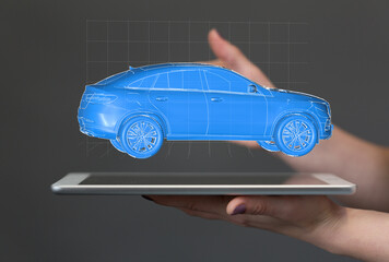 Innovative car design visualized on a tablet.  Future of automotive technology.