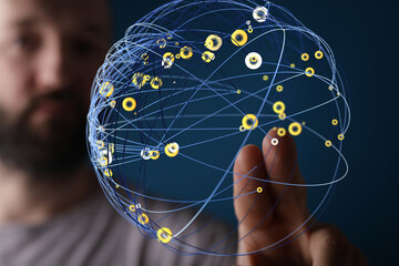 Abstract image of a man interacting with a digital global network, representing connection and...