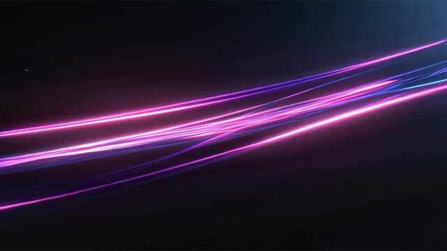 Estelas de luz ne&oacute;n en movimiento r&aacute;pido con c&aacute;mara din&aacute;mica