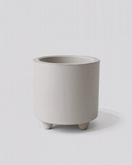 Minimalist concrete cylinder pot with short legs on plain white background