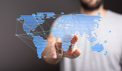 Hand interacting with a digital world map, illustrating global network and connection.