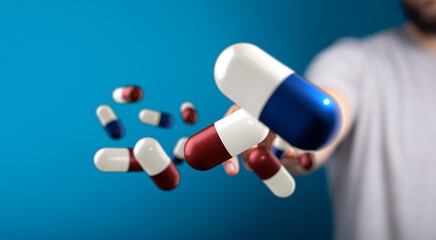 Person holding many colorful medicine capsules. Healthcare, pharmacy concept.