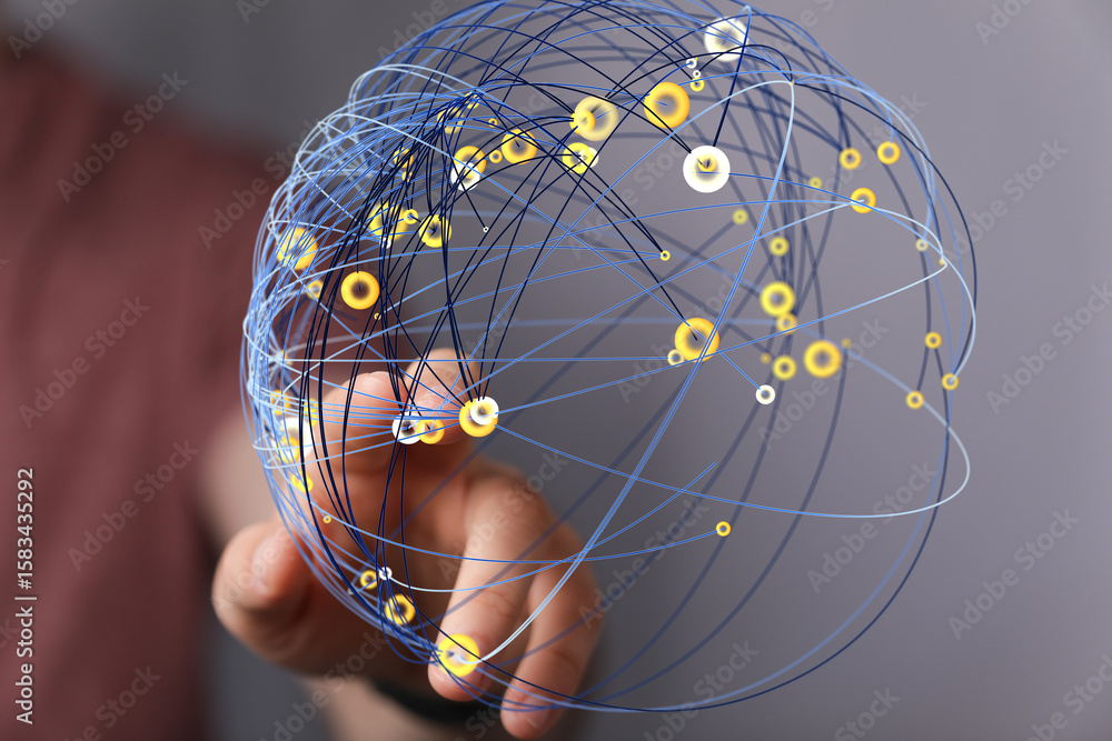 Poster abstract image of a hand interacting with a digital sphere representing global network connections.