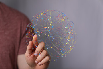 Abstract image of a hand interacting with a digital network. Ideal for technology, connection, and...