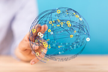 Hand interacting with a digital globe showing data connections.  Ideal for tech, network, and...