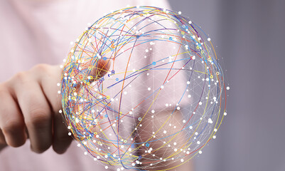 Hand interacting with a digital globe, representing global network, connection, and communication.