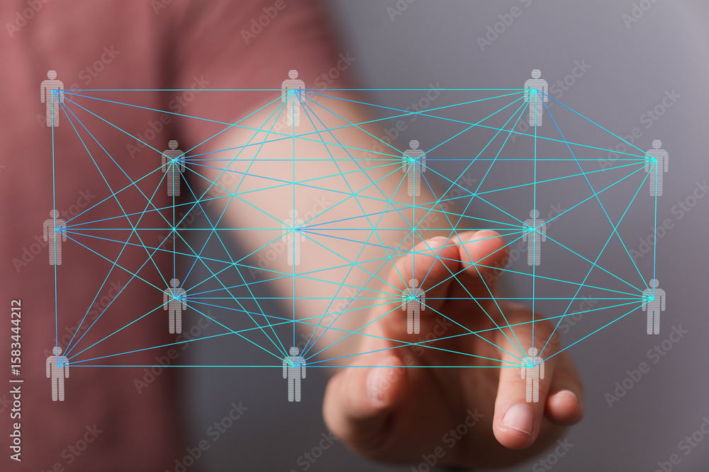 Poster image of a hand interacting with a digital network of interconnected people. represents global commu