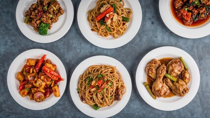 A sophisticated presentation of Chinese cuisine on white plates complemented by a blue-gray background