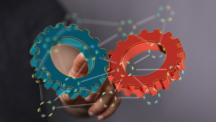 Image of two gears meshing, symbolizing teamwork, collaboration, and synergy in business.