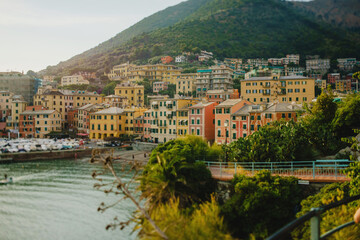 Fototapeta premium The landscape of the Ligurian coast. Sea, colored houses, mountains, boats, Liguria, Italy, Nervi