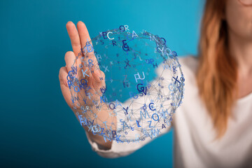 Abstract image of a woman interacting with a digital sphere of letters, representing global...