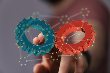 Image of two gears symbolizing teamwork, collaboration, and business success.