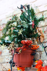 Christmas mood on city streets, design of external wall of building.