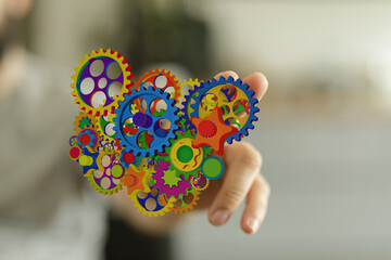 Image of colorful gears symbolizing teamwork, innovation, and complex systems. Perfect for business...