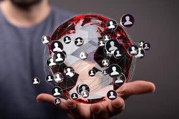 Person holding a digital globe showing social connections. Networking, global communication.