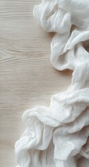 White fabric draped on light wood
