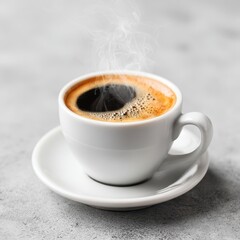 A cup of coffee with steam rising out of it