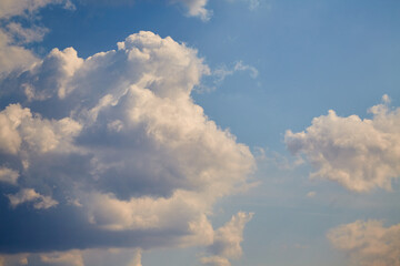 The sky covered with cumulus clouds resembles a 