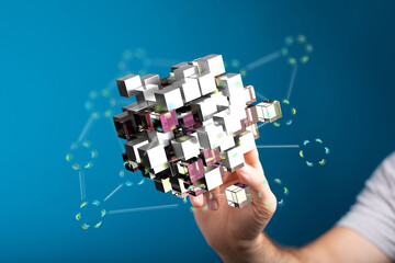 Abstract image of interconnected data cubes, representing network technology and data exchange.