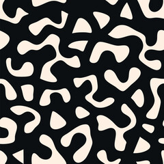 Vector seamless pattern with organic cutout shapes. Abstract funky texture with irregular forms, puzzle pieces, childish design. Modern black and white background. Repeated decorative pattern