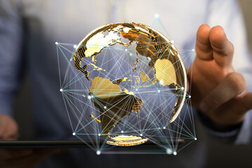 Abstract image of a golden globe with connection lines, representing global business and networking.