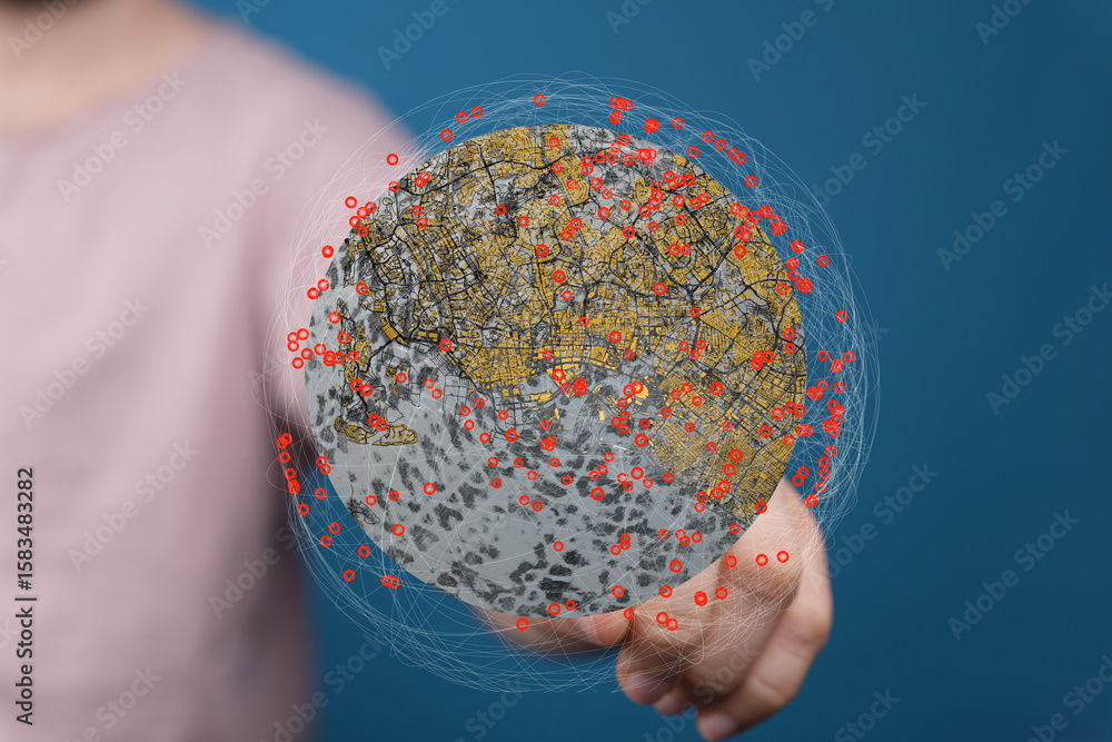 Poster person holding a digital globe showing interconnected data points. global network, data visualizatio