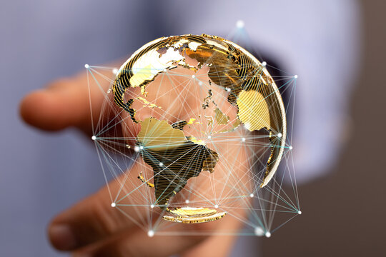 Image of a golden globe with connections, symbolizing global networking and international business. - Powered by Adobe