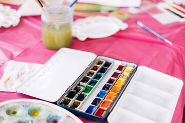 Watercolor paint palette with vibrant colors for art and creativity.