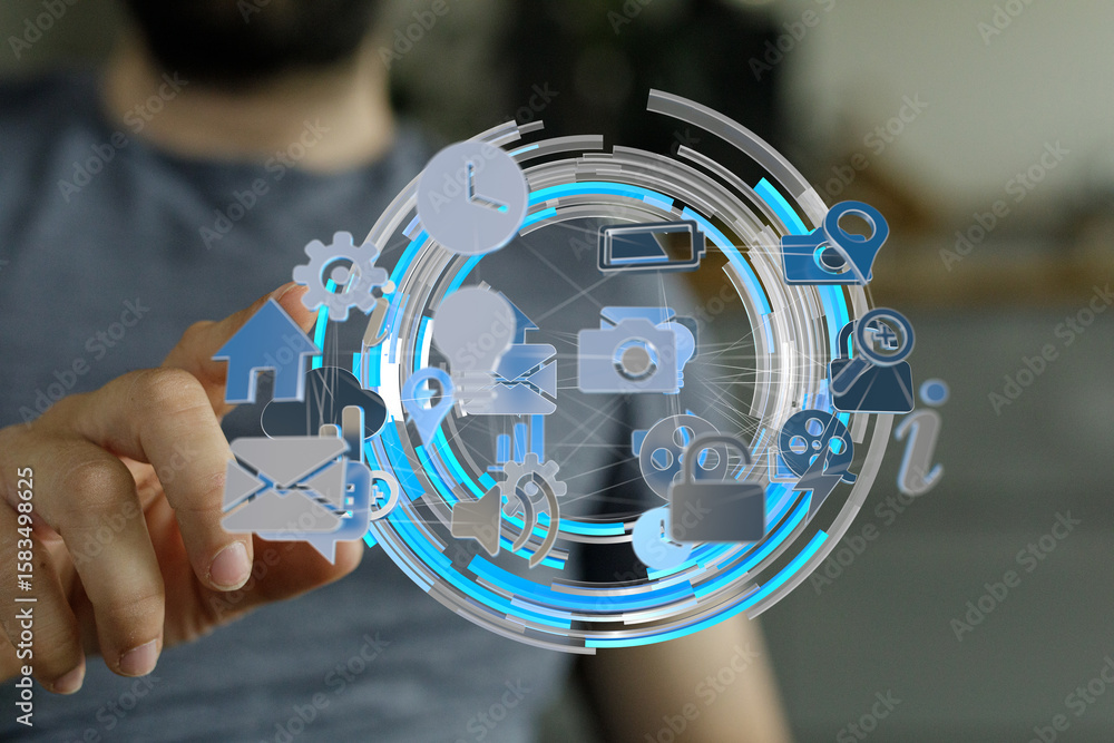 Poster person uses finger to interact with a digital interface displaying various application icons.