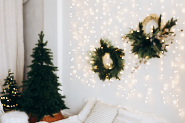 Festive living room adorned with Christmas decor and twinkling lights in cozy atmosphere