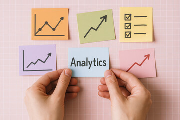 Hands arranging notes illustrate the growth trends and data evaluation processes essential for business strategy and performance insights