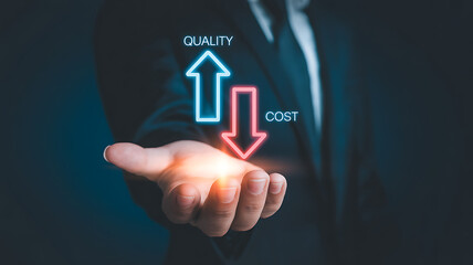 Upward arrow for quality and downward arrow for cost shown in neon lights over an open palm, representing business strategy and value optimization