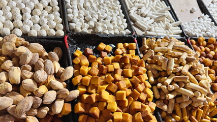 Different types of cheese displayed in the market in Uzbekistan
