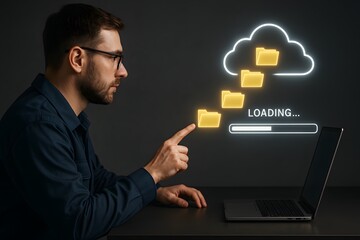 A caucasian male user points at glowing folder icons flying into a cloud over a laptop. Concept of secure file backup transfer.