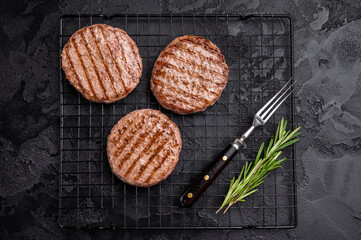 Juicy grilled meat patty cutlet with perfect grill marks, ideal for mouthwatering burgers and...