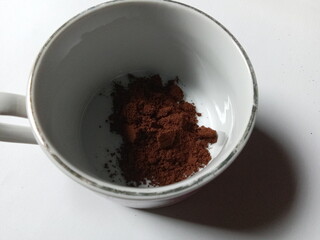 ground coffee in a mug.