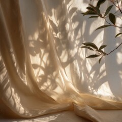 Soft sunlight casts shadows of leaves on a textured beige curtain, creating a serene and natural ambiance.
