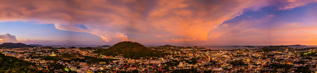 Aerial view of Khao Rang Viewpoint at dusk an important landmark in Phuket TownKhao Rang Viewpoint offers a panoramic view and the twinkling lights of Phuket Town at night, which are beautiful.