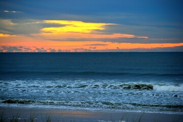 Vibrant color sunrise at ocean beach