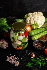 Jar of Pickled Vegetables with Fresh Ingredients