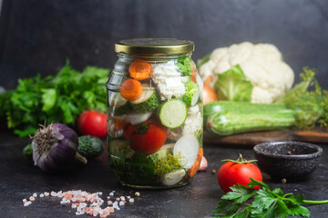 Jar of Pickled Vegetables with Fresh Ingredients
