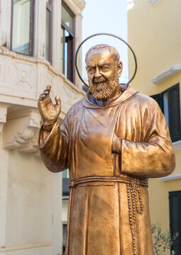 Bronze statue of Padre Pio located in the historic center of Gallipoli, Puglia, Italy