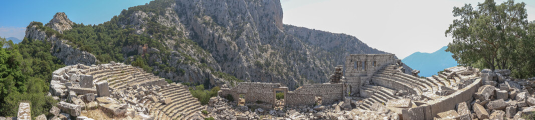 The amphitheater was built in the II century BC according to the classical Roman principle. Amphitheater in the ancient city of Termessos in Turkey. The amphitheater is high in the mountains.
