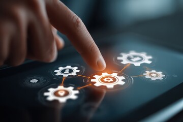 Finger touches a digital screen with gears and nodes, representing automation