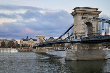 The Széchenyi Chain Bridge in Budapest, Hungary, connects Buda and Pest across the Danube river